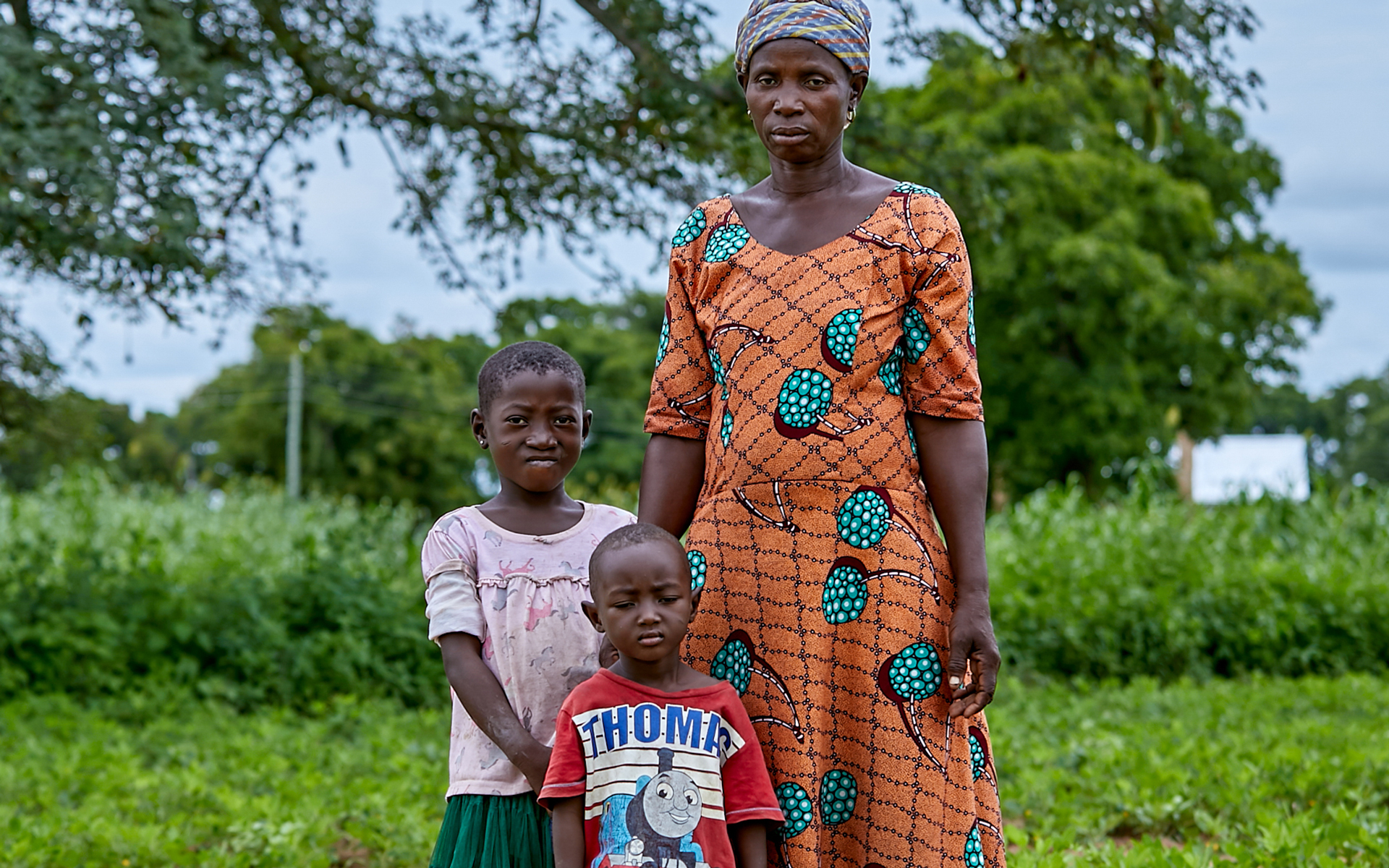 Kubaje, a women that Tree Aid is working with in Ghana, with her children.