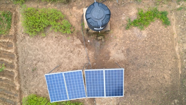 Aerial view of a solar powered borehole in Sahel field