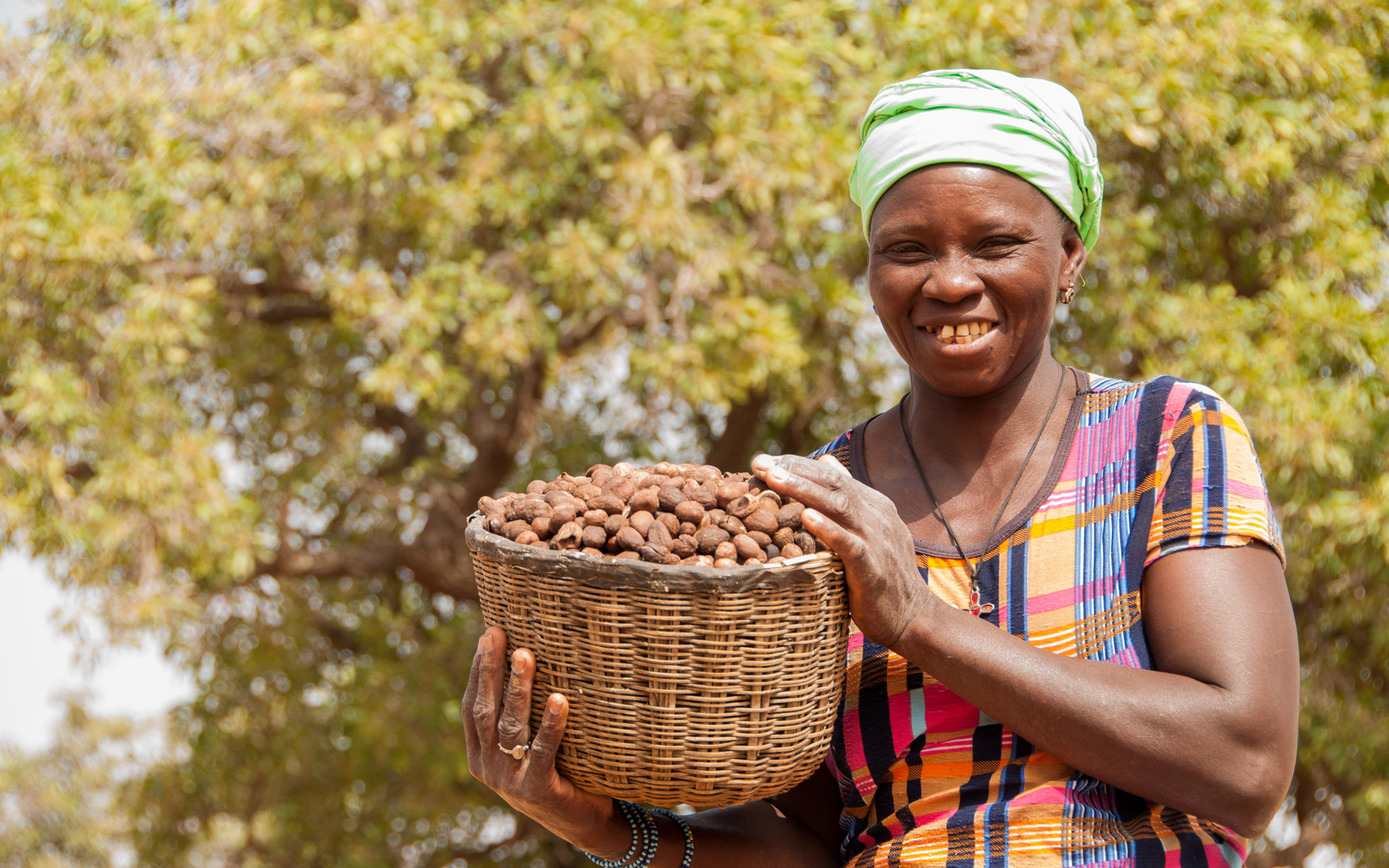 Sabine, project participant with shea nuts