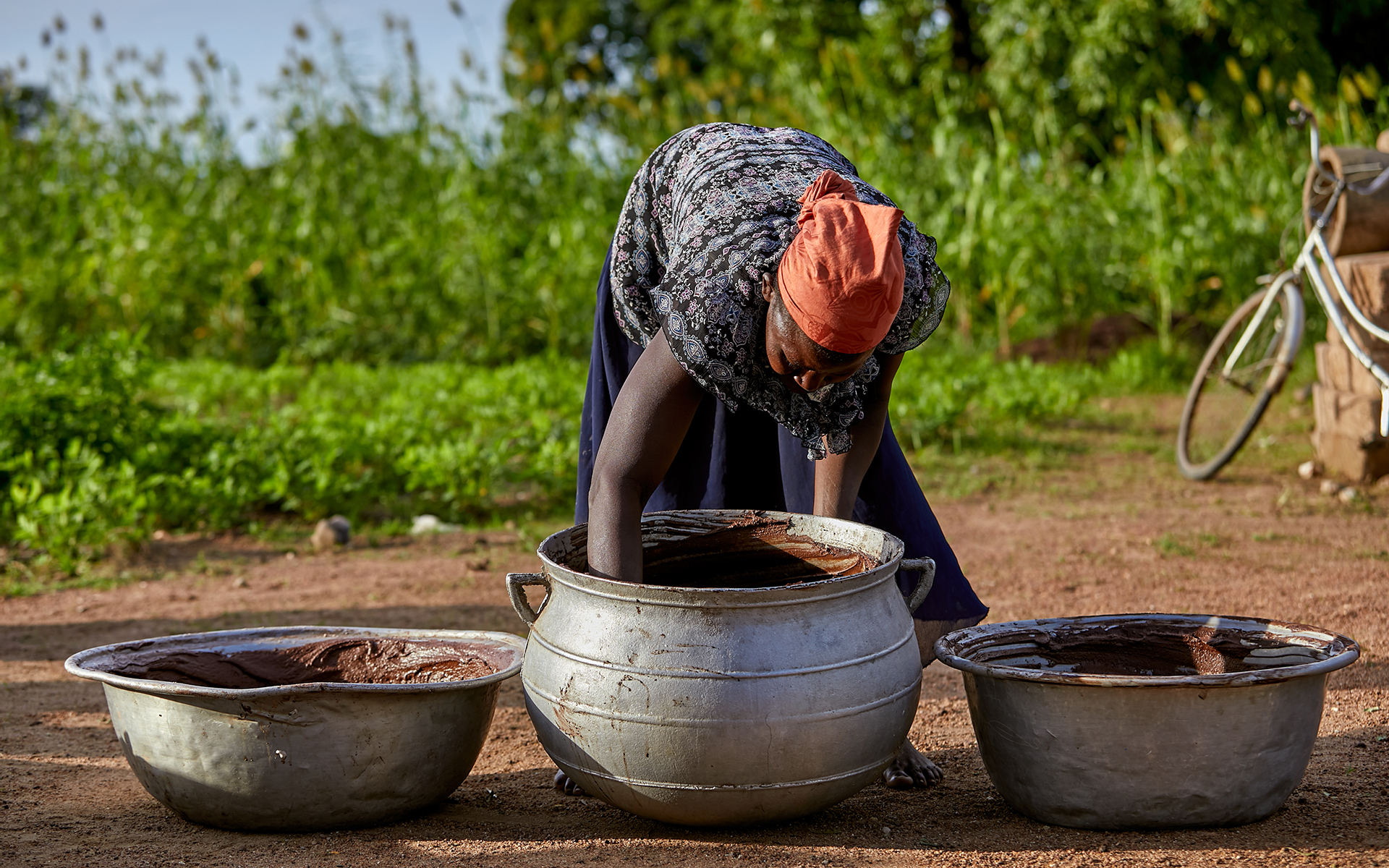 Kachana kneading shea butter.