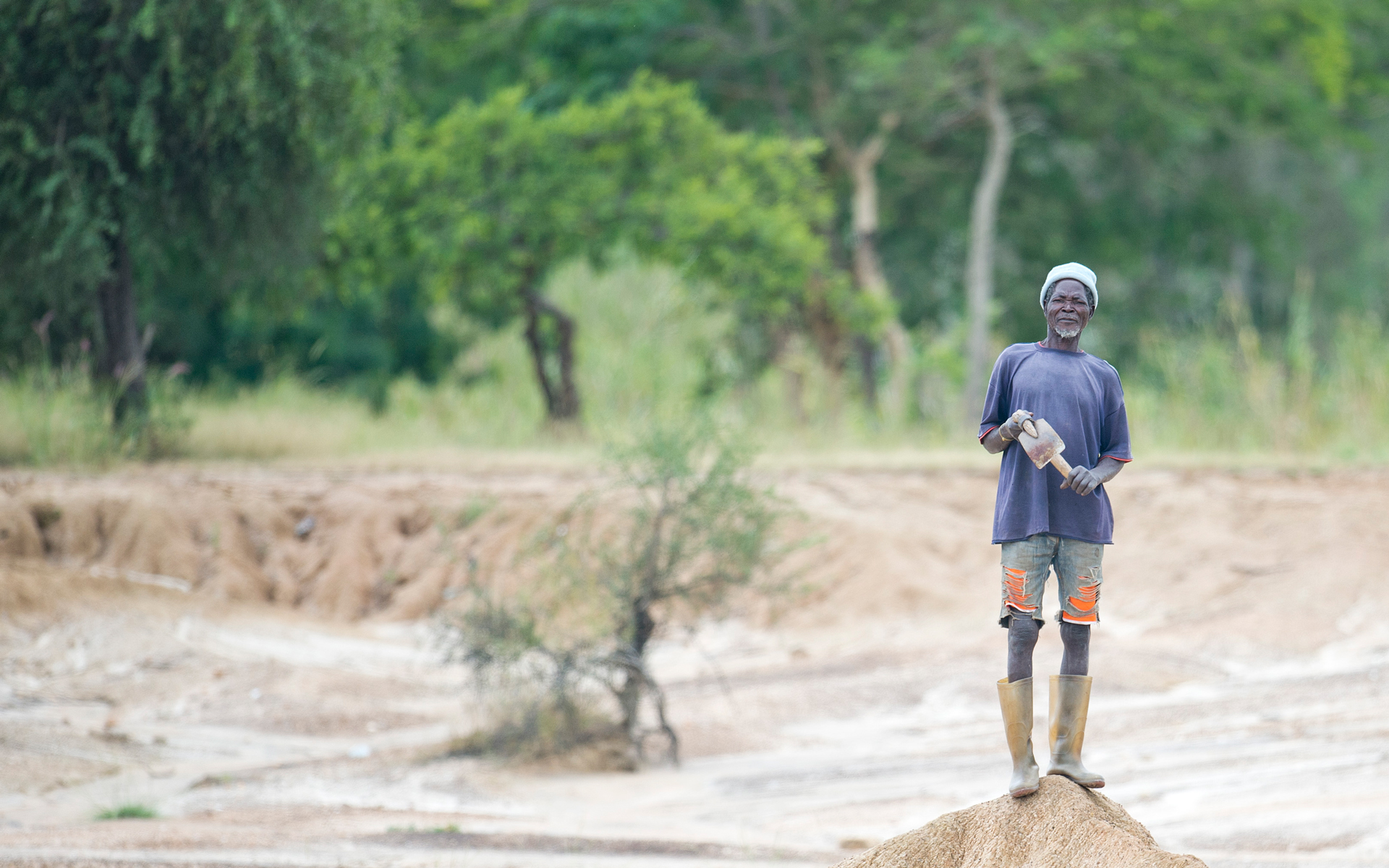 Mbole with his degraded land in Bongo, Ghana. Photo credit Rowan Griffiths, Daily Mirror.