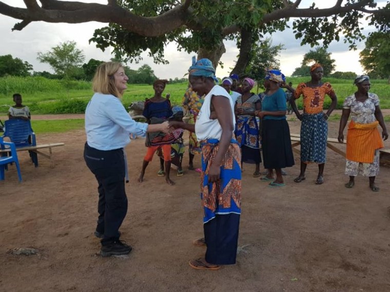Penny Marshall from ITV News meets with a Tree Aid women's shea enterprise group in Ghana