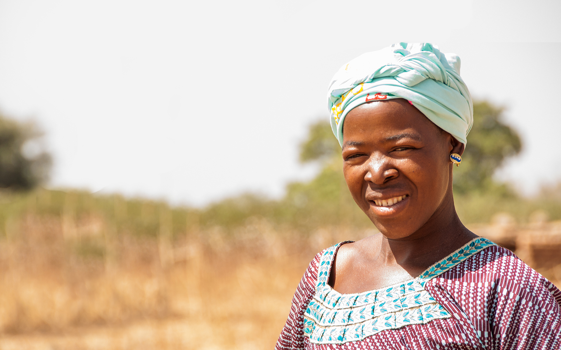 Close up of Anè, a project participant, smiling.